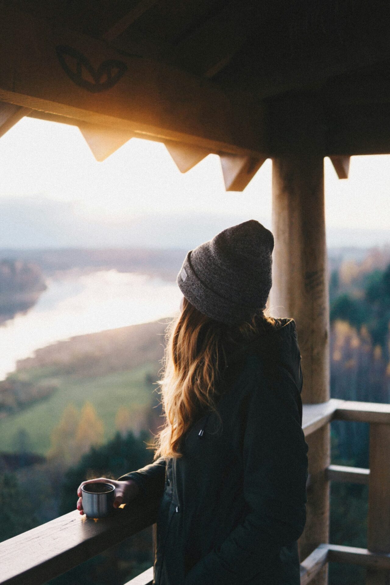 Organize your mind. Woman looking over a beautiful view.